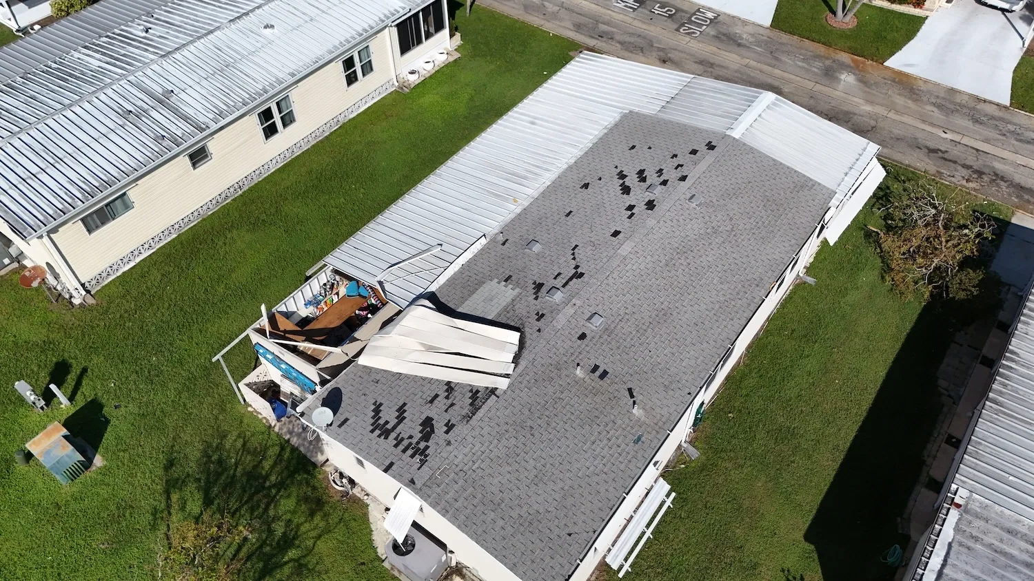 Commercial Wind Damage Roof Repair in Arvada, CO Commercial Wind Damage Roof Repair in Arvada, CO